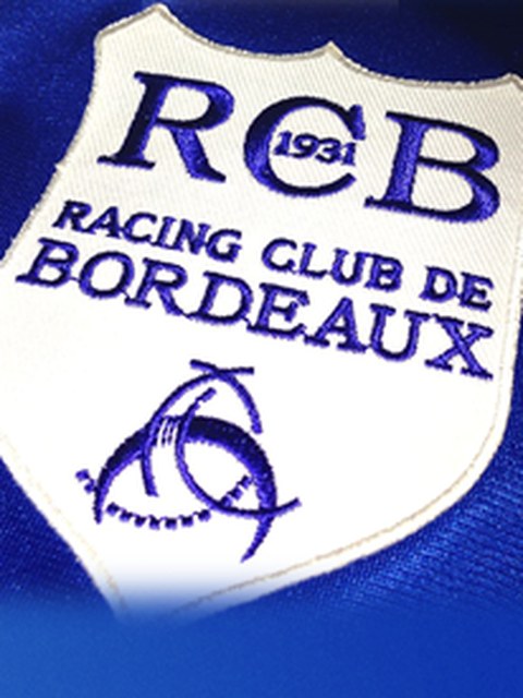 L’écusson brodé, tel qu’il était cousu sur le maillot.